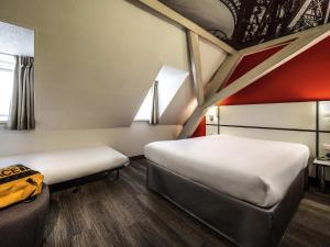 Postel nebo postele na pokoji v ubytování Ibis Styles Strasbourg Centre Gare