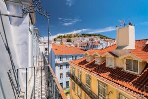 a view from a balcony of buildings and roofs at Tesouro da Baixa by Shiadu in Lisbon
