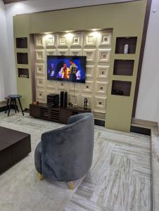 Televisyen dan/atau pusat hiburan di Charming modern house