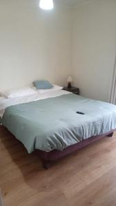 Cama o camas de una habitación en Depto vive los arrierros