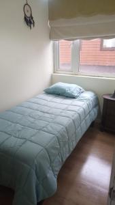 Cama o camas de una habitación en Depto vive los arrierros