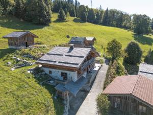 an aerial view of a house on a hill at Le Chalet des Serves in Demi-Quartier