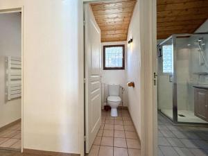 a bathroom with a toilet and a walk in shower at Chalet en Duplex 10 Pers. avec Terrasse/Jardin, Proche Pistes – La Salle les Alpes - FR-1-330F-3 in La Salle Les Alpes +18 photos