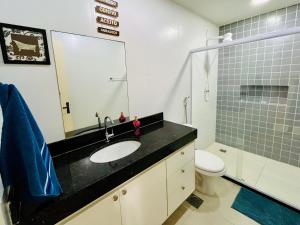 Koupelna v ubytování Casa charmosa e aconchegante em Cabo Frio + 30 fotografií