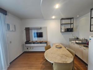 Kuchyň nebo kuchyňský kout v ubytování Modernidade e Charme no coração da Savassi