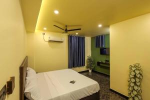 Ένα ή περισσότερα κρεβάτια σε δωμάτιο στο AYA rooms