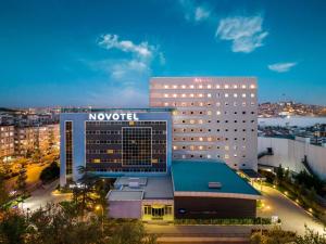 a hotel with a novation sign on top of a building at Novotel Gaziantep in Gaziantep