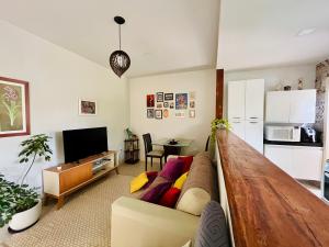 TV a/nebo společenská místnost v ubytování Casa charmosa e aconchegante em Cabo Frio