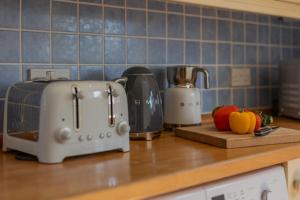 Kuchyň nebo kuchyňský kout v ubytování Fairway