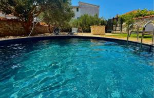 Bazén v ubytování Stunning Apartment In Tribunj nebo v jeho okolí + 27 fotografií