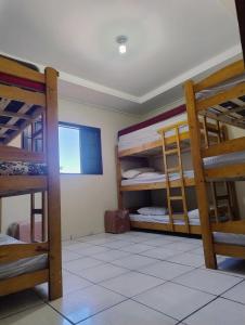 Katil atau katil-katil dalam bilik di Leisure Space - Refúgio com Piscina climatizada e churrasqueira