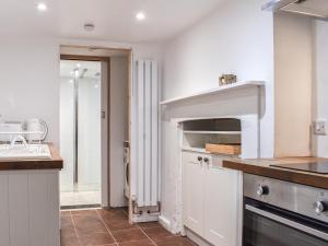 a kitchen with a sink and a counter top at Whitby Bliss in Whitby +11 photos