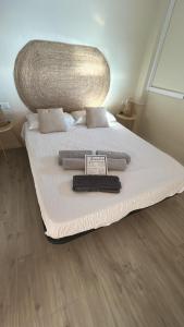 En eller flere senge i et værelse på Balcón al mar - A 50 metros de la playa