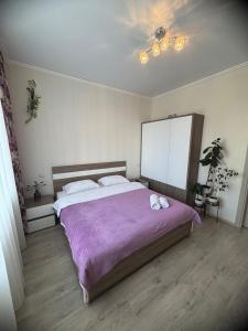 Ένα ή περισσότερα κρεβάτια σε δωμάτιο στο Domik