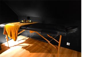 a table with candles on it in a room at La Sainteny Touch in Sainteny +11 photos