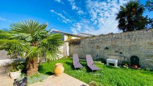 Κήπος έξω από το Villa de plain pied à l intérieur des remparts