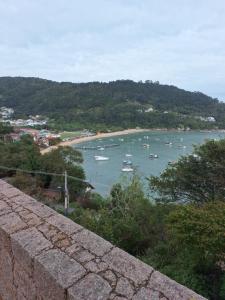 a view of a harbor with boats in the water at Garcida in Governador Celso Ramos