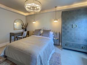 Postel nebo postele na pokoji v ubytování Mj Apartment + 5 fotografií
