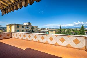 a balcony with a view of a city at YD penthouse Torregalli in Scandicci