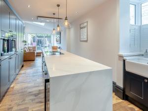 Köök või kööginurk majutusasutuses The Trinitys