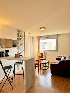 Η κουζίνα ή μικρή κουζίνα στο Le Saint Jean, Ouest de Rennes, avec balcon et stationnement +20 φωτογραφίες