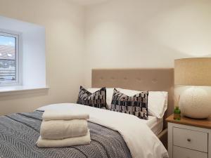 Voodi või voodid majutusasutuse Kilconquhar Cottage toas