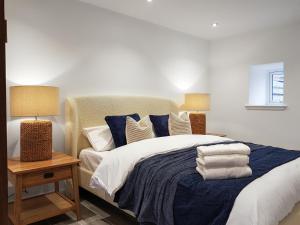 Voodi või voodid majutusasutuse Kilconquhar Cottage toas