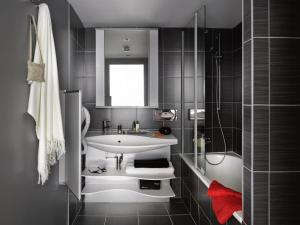Koupelna v ubytování Aparthotel Adagio Strasbourg Place Kleber