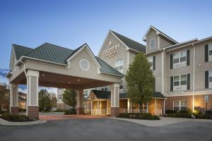 a rendering of a hotel with a parking lot at Country Inn & Suites by Radisson, Toledo South, OH in Rossford