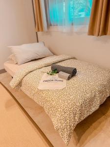 Postel nebo postele na pokoji v ubytování Choon home Chiangmai