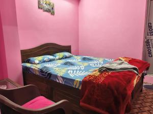 Giường trong phòng chung tại Tulip Nest Homestay