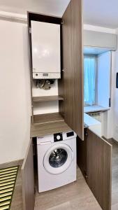 Kuchyň nebo kuchyňský kout v ubytování La Chicca + 5 fotografií