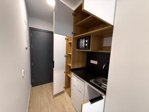 Η κουζίνα ή μικρή κουζίνα στο Residencia JC1 +6 φωτογραφίες