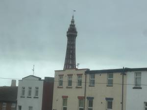 a tower in the middle of a city with buildings at Cadeby Lodge in Blackpool
