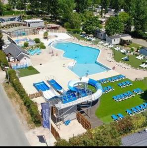 an aerial view of a pool with a water park at Mobile home 2chs 4à5 pers 32m2 promo fun pass sept in Onzain