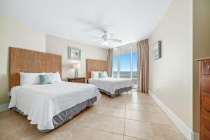 Ένα ή περισσότερα κρεβάτια σε δωμάτιο στο Caribe C815 +63 φωτογραφίες