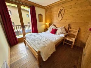 Postel nebo postele na pokoji v ubytování Appartement confortable pour 6 pers. à Saint-Martin, proche pistes, parking, WiFi - FR-1-452-395