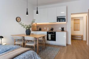 Η κουζίνα ή μικρή κουζίνα στο MW 6 Apartament +16 φωτογραφίες
