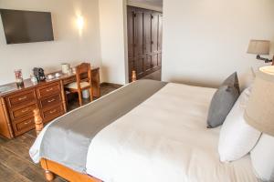 Postel nebo postele na pokoji v ubytování Sandos Finisterra All Inclusive