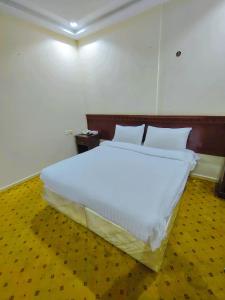 Photo de la galerie de l'établissement فندق عملاق المشرق Amlaq ALMSHRQ HOTEL, à Al Gharīth 17 autres photos