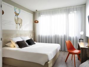 Ένα ή περισσότερα κρεβάτια σε δωμάτιο στο ibis Styles Rennes St. Gregoire +71 φωτογραφίες