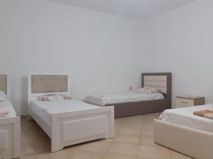 Ένα ή περισσότερα κρεβάτια σε δωμάτιο στο Mino's House