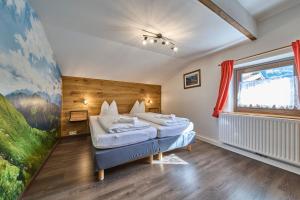 Postel nebo postele na pokoji v ubytování Apartments Enzian