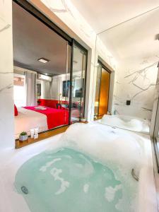 Ένα ή περισσότερα κρεβάτια σε δωμάτιο στο Flame Boutique Hotel by Unna