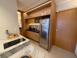 Η κουζίνα ή μικρή κουζίνα στο Studio Design 3 Apt 913 -Mandi Hospitalidade