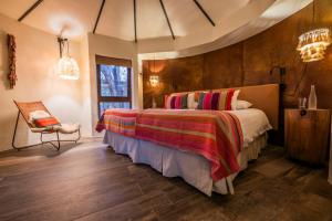 Postel nebo postele na pokoji v ubytování Hotel Desertica