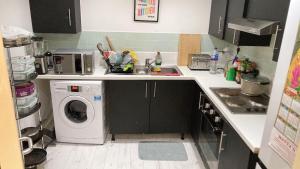 Η κουζίνα ή μικρή κουζίνα στο Chic & Central Liverpool Flat