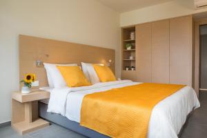 Postel nebo postele na pokoji v ubytování Sundance Apartments & Suites