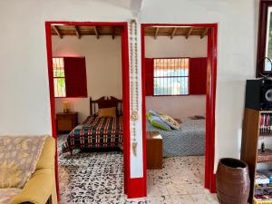 a bedroom with two bunk beds in a room at Finca cafetera para descanso in Fredonia