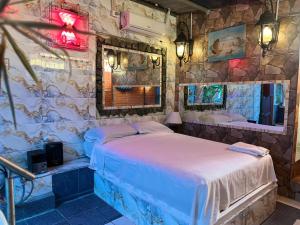 Giường trong phòng chung tại Hotel Andaluz Guayaquil +19 ảnh